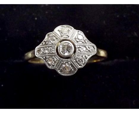 An Edwardian 18ct gold diamond cluster ring 