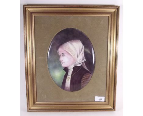 A porcelain oval panel painted portrait of a woman by G Delaney, 24 x 18cm