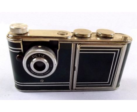 A Kunik Walter Petite vanity camera with integral compact 