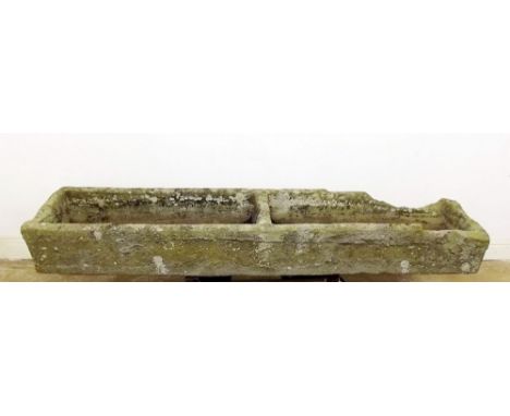 A large double antique stone trough 6ft 3" x 18"