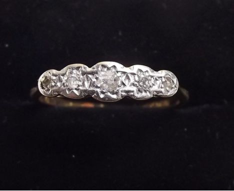 An Edwardian 18ct gold and platinum set  five stone diamond ring , size O