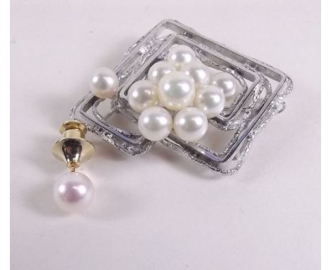 A silver and pearl modernist brooch and a pearl tie pin 