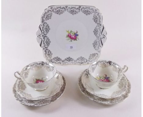 A Foley floral and gilt tea service comprising: six cups, nine saucers, eleven tea plates and two cake plates 