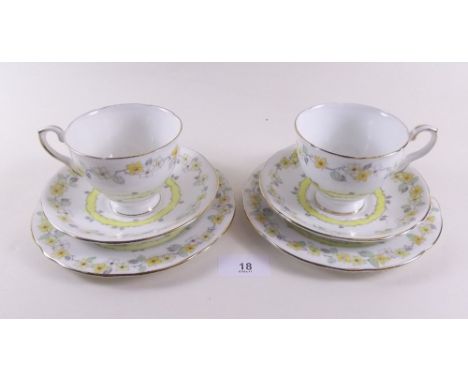 A Royal Stafford tea service printed yellow flowers comprising: six cups and saucers and six plates 