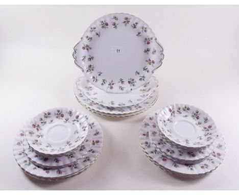 A Royal Albert 'Winsome' part tea service comprising: two cake plates, two dinner plates, six saucers, five tea plates and si