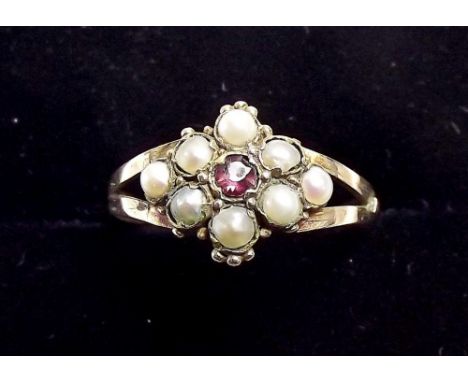 A Victorian pearl and ruby cluster ring , size N.5