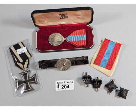 WWI period German Iron Cross Second Class, and Leitz range finder, selection of British Military soldier pips and Queen Eliza