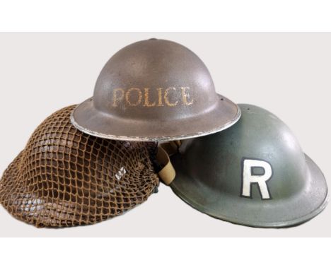 Collection of three WWII British Civilian helmets to include: MK.II Brodie Police helmet, MK.II Brodie 'R' (Rescue) helmet an