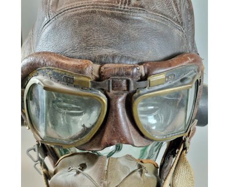 Leather flying helmet in classic British style with British design Aviator Pilot's goggles. (Mannequin head for display only)