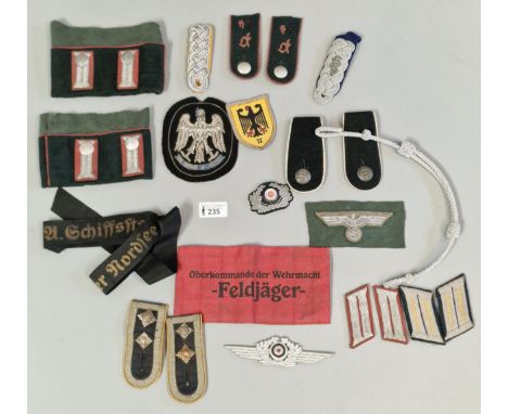 Collection of German Third Reich design fabric badges, flashes, cuffs, arm band, epaulettes and Naval cap ribbon. (B.P. 21% +