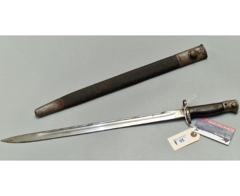 WWI period Enfield bayonet and scabbard marked 'Wilkinson' and dated 1907 with No. 029 to the hilt. Overall 58cm long approx.