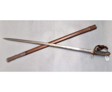 Queen Victoria British Army Officer's sword, by Wilkinson's &amp; Co. Pall Mall, having single edge scroll engraved and fulle