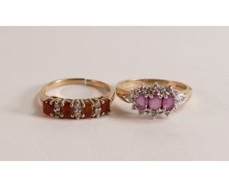 Two 9ct gold ladies dress rings, one set with orange &amp; white stones, ring cut,size M and the other set with pink stones, 
