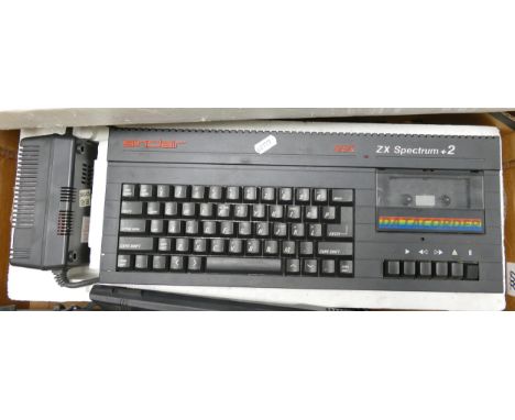 A Sinclair ZX Spectrum +2 in Original Styrofoam Housing together with Joystick, Two Magnum light Phaser Guns. Untested 