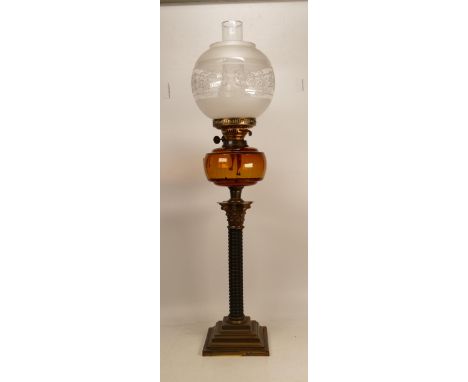 A Victorian Duplex Oil Lamp. Square Based with Carved Wood Column terminating in a Corinthian Column Top, Amber/Brown Glass B