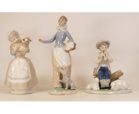 Nao figures Girl with basket and dog 590, Girl with lamb 0120 and Boy playing flute with lambs. Height of tallest 27cm (3) 