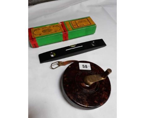  Sale Item:    RABON BAKELITE SPIRIT LEVEL &amp; BAKELITE TAPE MEASURE  Vat Status:   No Vat   Buyers Premium:  This lot is s