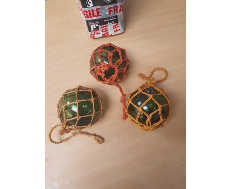  Sale Item:    3 GLASS FISHING FLOATS   Vat Status:   No Vat   Buyers Premium:  This lot is subject to a Buyers Premium of 15
