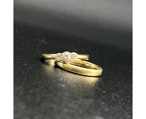 18ct yellow gold wedding band and engagement ring,
wedding band is a M 1/2 is a nice heavy ring D shape 3mm weighs 4.1 grams,