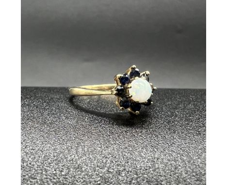 9ct yellow gold sapphire and opal daisy style ring,size K,weight 1.6grams