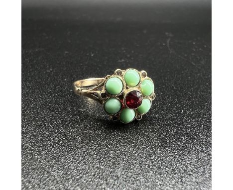 9ct yellow gold Victorian turquoise and garnet ring,
size P,
hallmarked,
Weight 2.6 grams