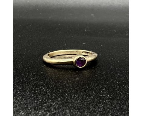 9ct yellow gold amethyst rub over setting dress ring,
weight 1.7 grams,
Size N