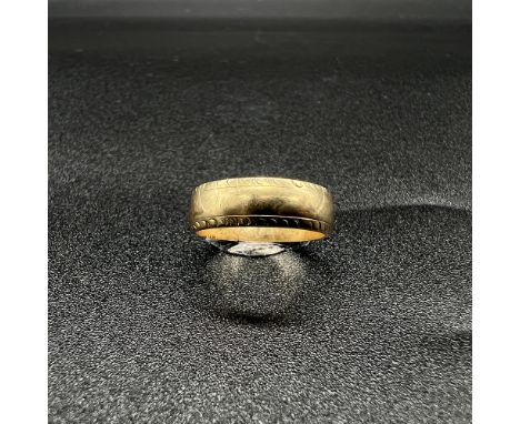 9ct yellow gold ring,
5mm fancy wedding band,
2.9 grams in weight,
Size J leading edge