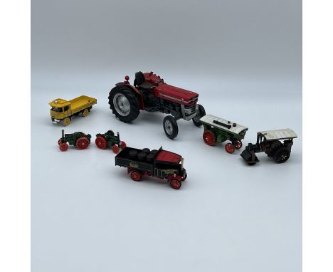 A collection of steam models and a model tractor