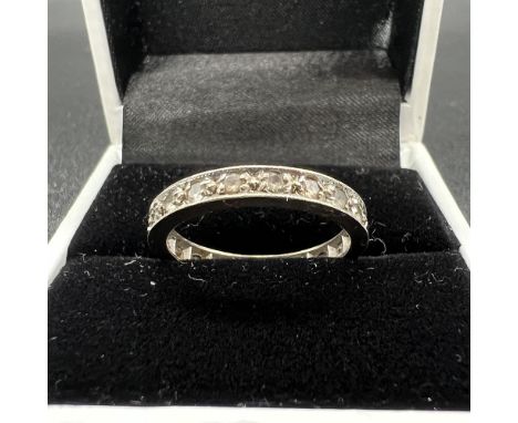 9ct white gold full eternity ring,
cz stones,
2.2 grams,
size M1/2