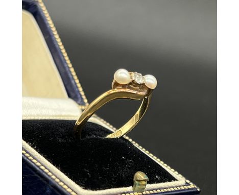 18ct yellow gold diamond and cultured pearl set ring,
size P,
weight is 3.2 grams