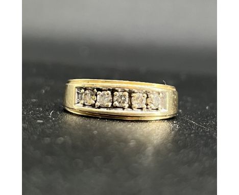 14ct yellow gold 5 stone gents dress ring,
7mm wide,
weigh 7 grams,
size is leading edge U