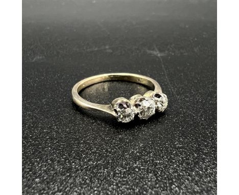 3 stone diamond ring 18 ct yellow gold,
no hallmark,
2.1 grams,
size K