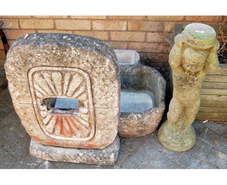 A reconstituted stone garden trough, together with a further stone stele garden ornament, and a standing stone cherub (3)
