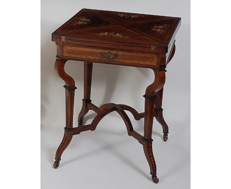 A Sheraton Revival rosewood and marquetry inlaid envelope card table, the top opening to reveal baize lined playing surface w
