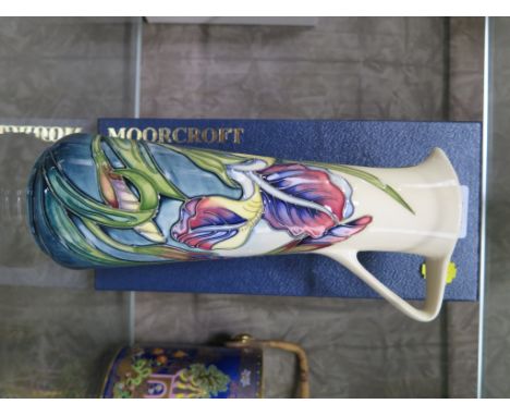 A Moorcroft Pottery Iris design jug designed and signed by Rachel Bishop, numbered MCC 2445, with box and leaflet