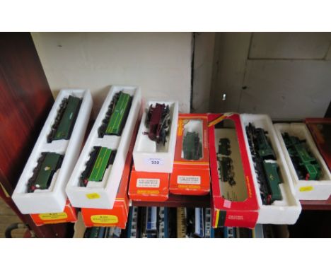 Hornby Railways locomotives: R.374 Spitfire, another R.374 overpainted as 'Fighter Pilot', BR 2-6-0 Ivatt Class and three tan