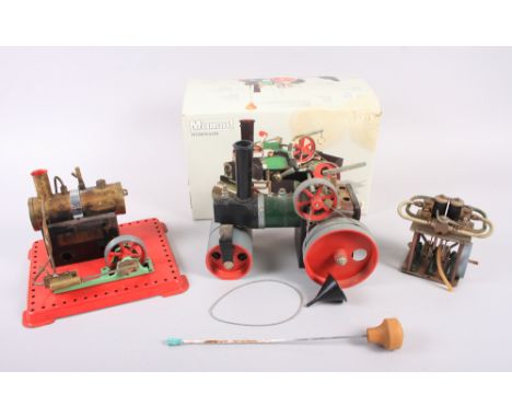 A Mamod steam roller, in box, a Mamod steam engine and a Mamod twin piston engine