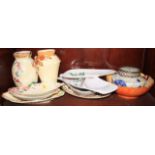 Two Arthur Wood jugs, a Crown Ducal bowl, two Maling plates, three Carlton ware dishes and other