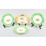 An English porcelain two-handled fruit dish, decorated floral spray with yellow and gilt border, and