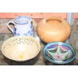 An Aldermaston pottery bowl, 6 1/2" dia, two other similar bowls, a tin glazed jug, and a turned