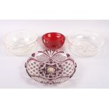 A 1930s amethyst overlaid and cut glass shallow dish with silver central boss, 12" dia, two cut