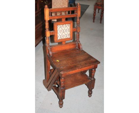 A late 19th century oak metamorphic library chair/step, on shaped supports, 36" high overall