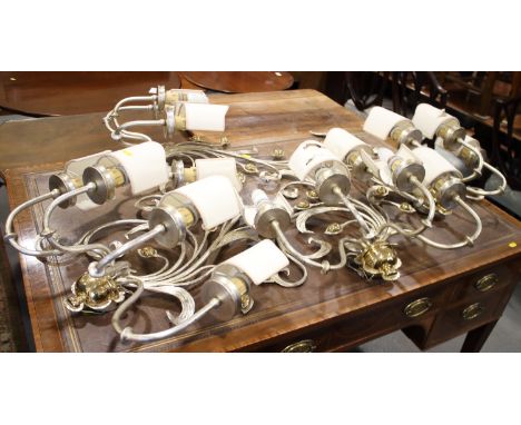 Two pairs of silvered metal and gilt four-light wall lights, 25" high