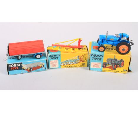 A Corgi Toys die-cast model Fordson "Power Major" tractor, No 55, a Platform trailer, No 101, and a Four Furrow Plough, No 56