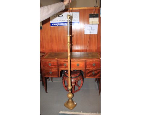 A brass sectional standard lamp, on square base