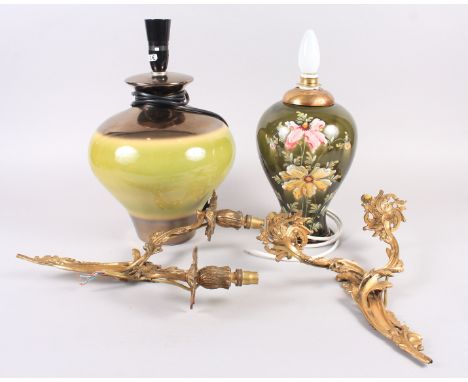 A contemporary table lamp, a green glazed table lamp, decorated with flowers, and a pair of gilt, two-light wall sconces