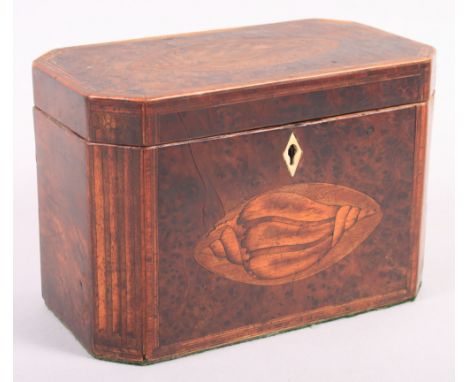 A 19th century amboyna and shell paterae inlaid octagonal tea caddy, 71/2" wide