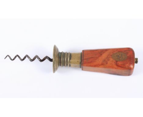 A Victorian brass and kingwood corkscrewCondition: Only mark engraved is the crest, light surface scratches, good overall con