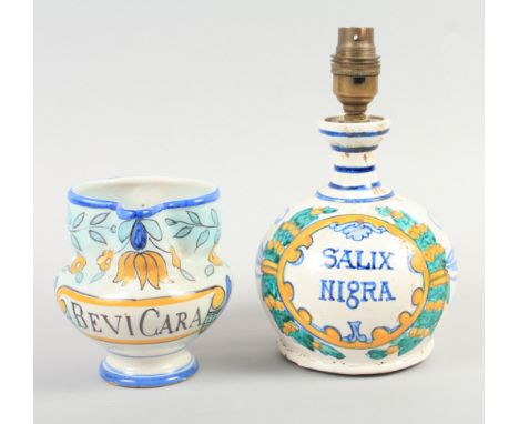 A tin glazed earthenware bottle, "Salix Nigra", 6 3/4" high, converted to a table lamp, and a similar jug, "Bevicara", 5" hig