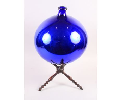 A 19th century blue and mirror glass sphere/witch ball, 14" dia, on a 19th century turned wood wool winderCondition: Some los